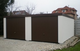 Assembled garage with plaster and flat roof