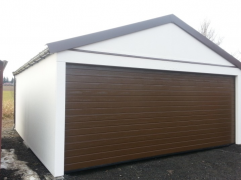 Assembled garage with a shelter and a saddle roof